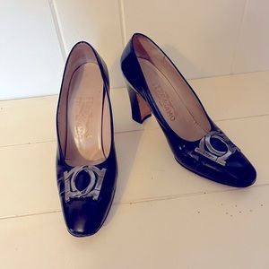 Salvatore Ferragamo Black Leather Heel Pumps.